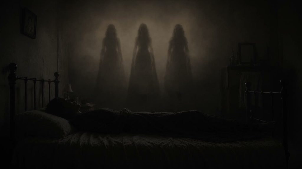 Three angelic figures standing beyond a rain-streaked window in warm light